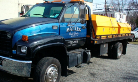 Malles Auto Body & Towing - Flatbed